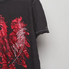 Close-up of the sleeve on the Vintage 2000s Marc Ecko Foil Eagle T-Shirt XL