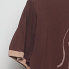 Close-up of the Left sleeve on the Vintage Y2K McCafé "Coffee Menu" T-Shirt - M