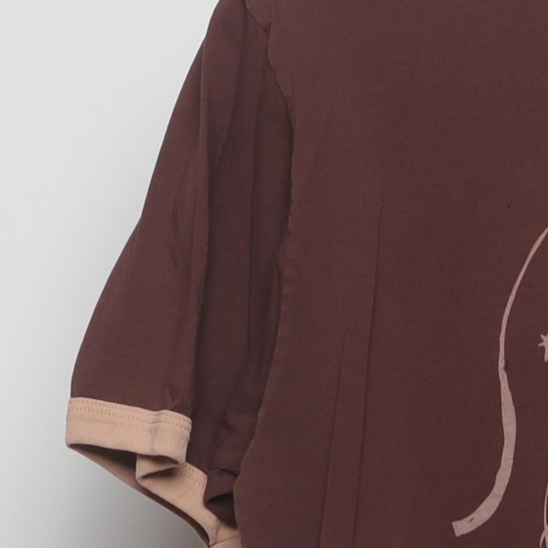 Close-up of the Left sleeve on the Vintage Y2K McCafé "Coffee Menu" T-Shirt - M