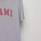Close-up of the sleeve on the Vintage 2000s Miami Collegiate Arch Logo T-Shirt L