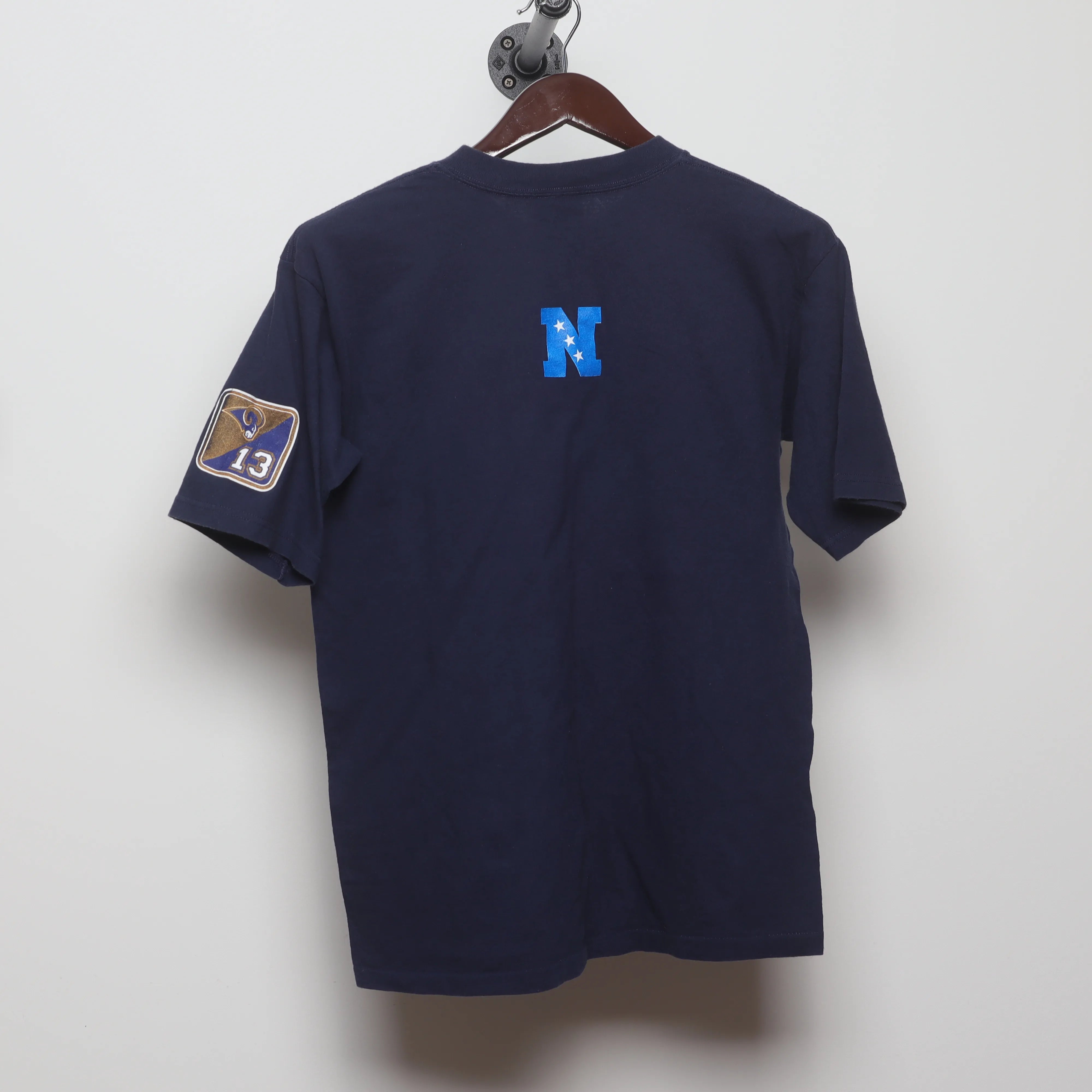 Back view of Vintage 2000s St. Louis Rams Kurt Warner T-Shirt M