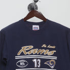 Close-up of the collar and tag on the Vintage 2000s St. Louis Rams Kurt Warner T-Shirt M