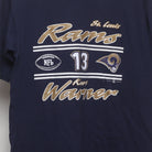 Close-up of the main graphic on the Vintage 2000s St. Louis Rams Kurt Warner T-Shirt M