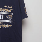 Close-up of the sleeve on the Vintage 2000s St. Louis Rams Kurt Warner T-Shirt M