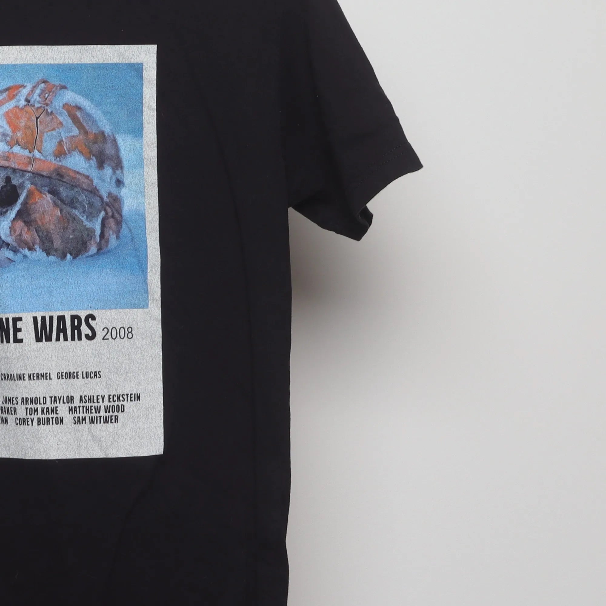 Close-up of the sleeve on the Vintage 2000s Star Wars Clone Wars Movie Poster Tee S