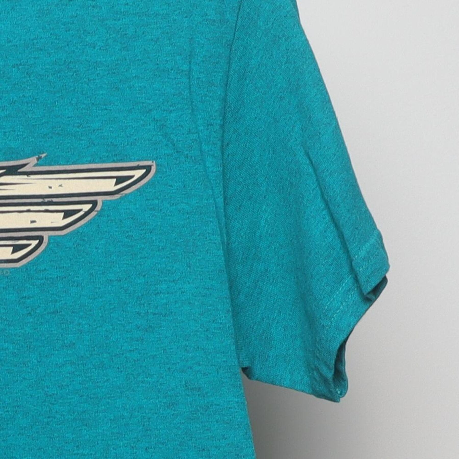 Close-up of the Right sleeve on the Vintage 1980s Harley-Davidson "World Famous Motorcycles" T-Shirt - S