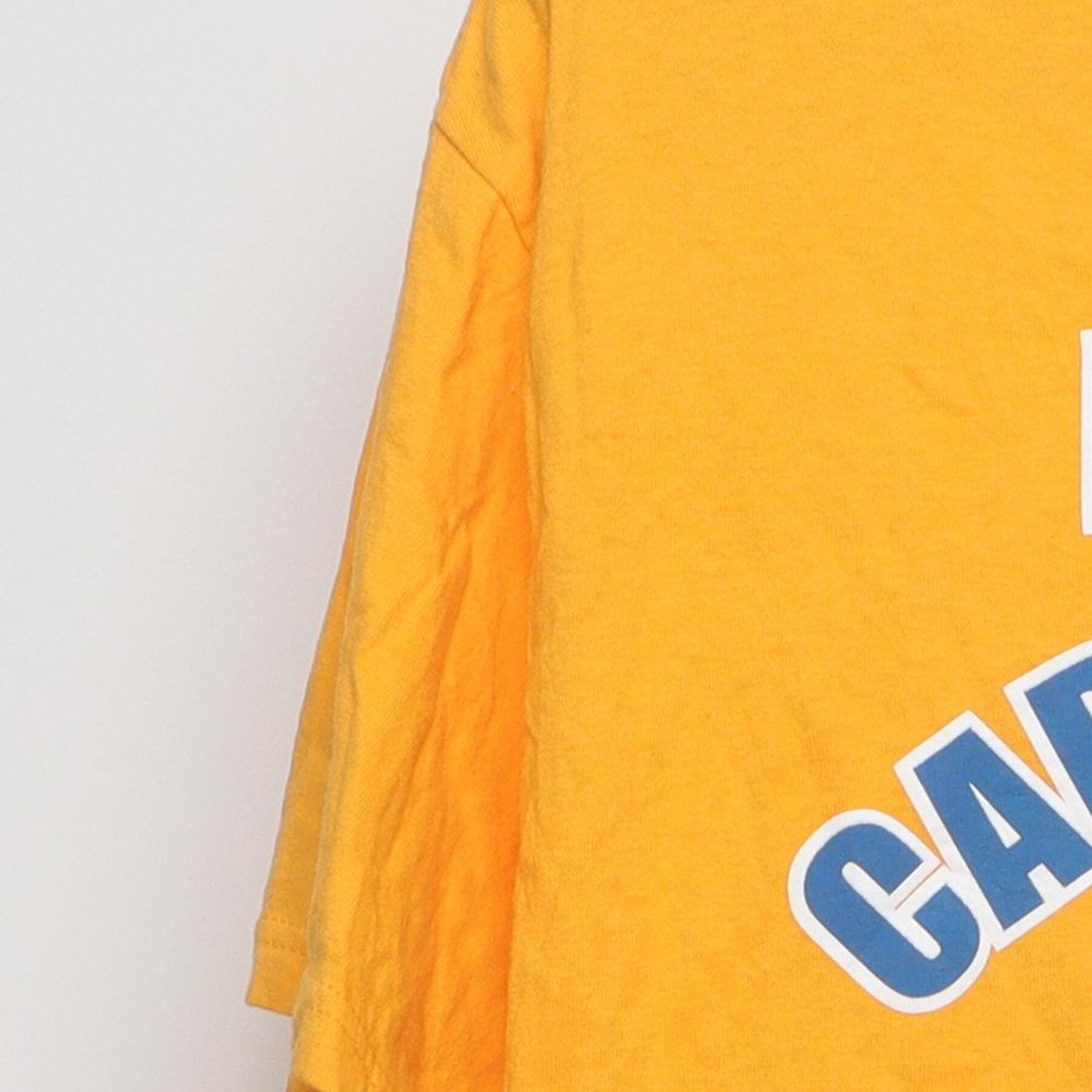 Close-up of the Left sleeve on the Vintage Y2K Meineke Car Care Bowl "West Virginia Mountaineers" T-Shirt - L