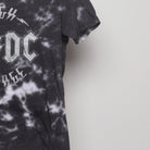 Close-up of the sleeve on the Vintage 2010s AC/DC High Voltage Tie-Dye Tee S