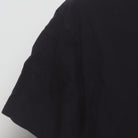 Close-up of the single stitch sleeve on the Vintage 2010s Attack on Titan "Eren Yeager Attack Titan" T-Shirt - L