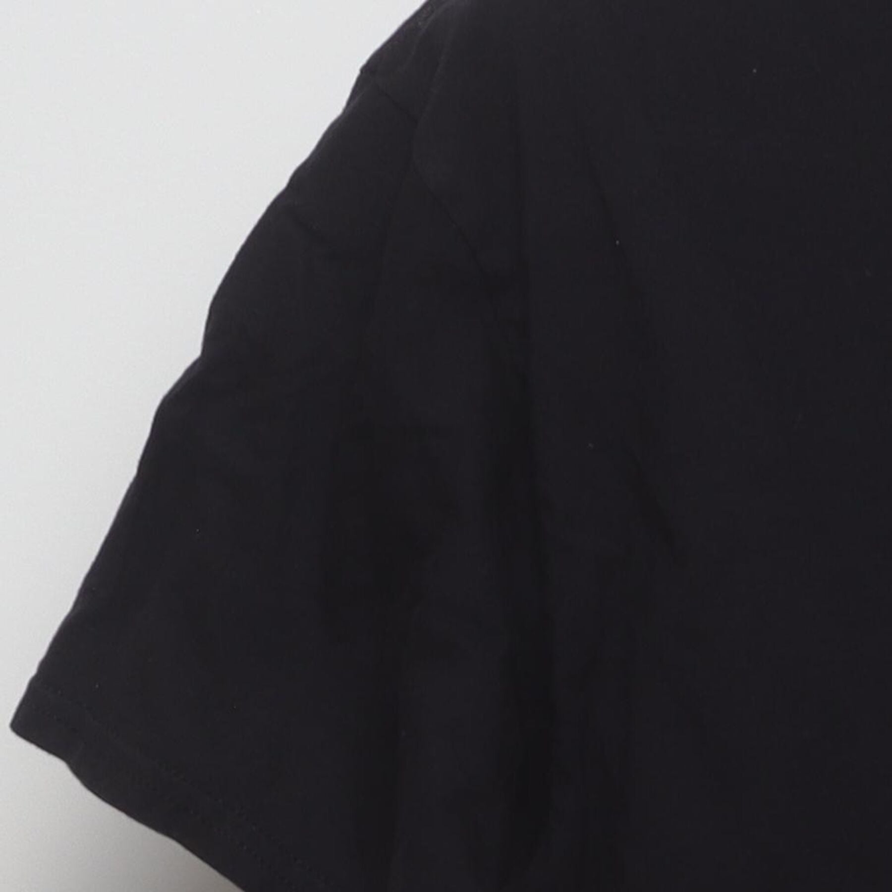 Close-up of the single stitch sleeve on the Vintage 2010s Attack on Titan "Eren Yeager Attack Titan" T-Shirt - L