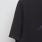 Close-up of the sleeve on the Vintage 2010s Baltimore Ravens "Joe Flacco #5" T-Shirt - L