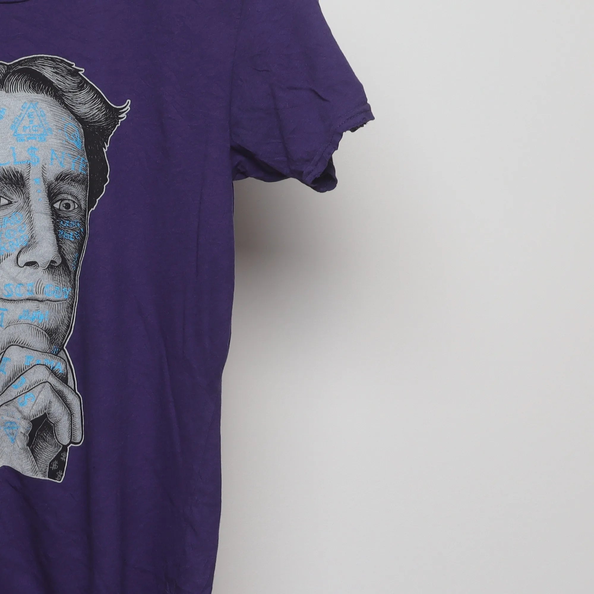Close-up of the sleeve on the Vintage 2010s Bill Nye Tattoo Graphic Tee S