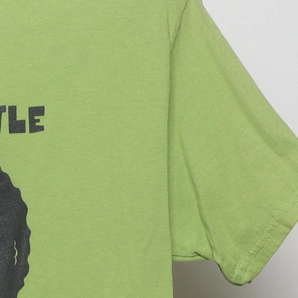 Close-up of the sleeve on the Vintage 2010s Bob Ross "Happy Little Art Accidents" T-Shirt - M