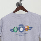 Close-up of the collar and tag on the Vintage 2010s Champions Cup Soccer Match T-Shirt M