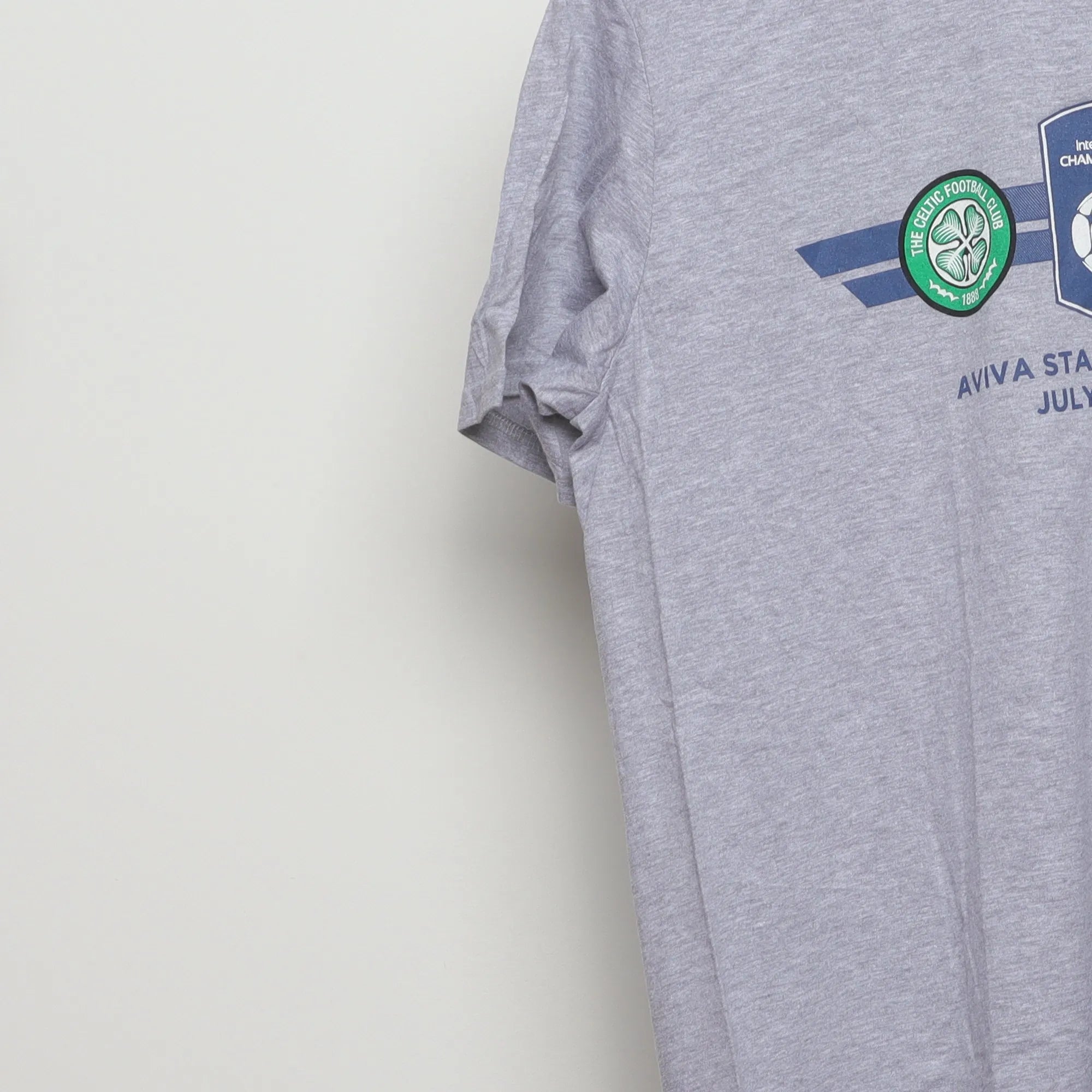 Close-up of the sleeve on the Vintage 2010s Champions Cup Soccer Match T-Shirt M