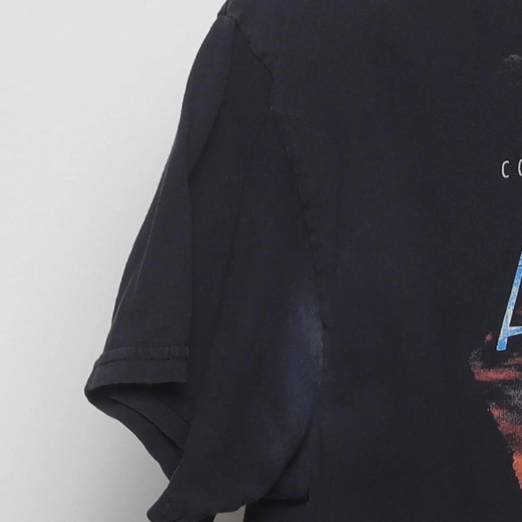 Close-up of the single stitch sleeve on the Vintage 2010s Copperas Cove High School Band "Adventure" T-Shirt - M