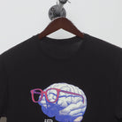 Close-up of the collar and tag on the Vintage 2010s Defy Brain Glasses Graphic T-Shirt M