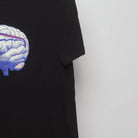 Close-up of the sleeve on the Vintage 2010s Defy Brain Glasses Graphic T-Shirt M