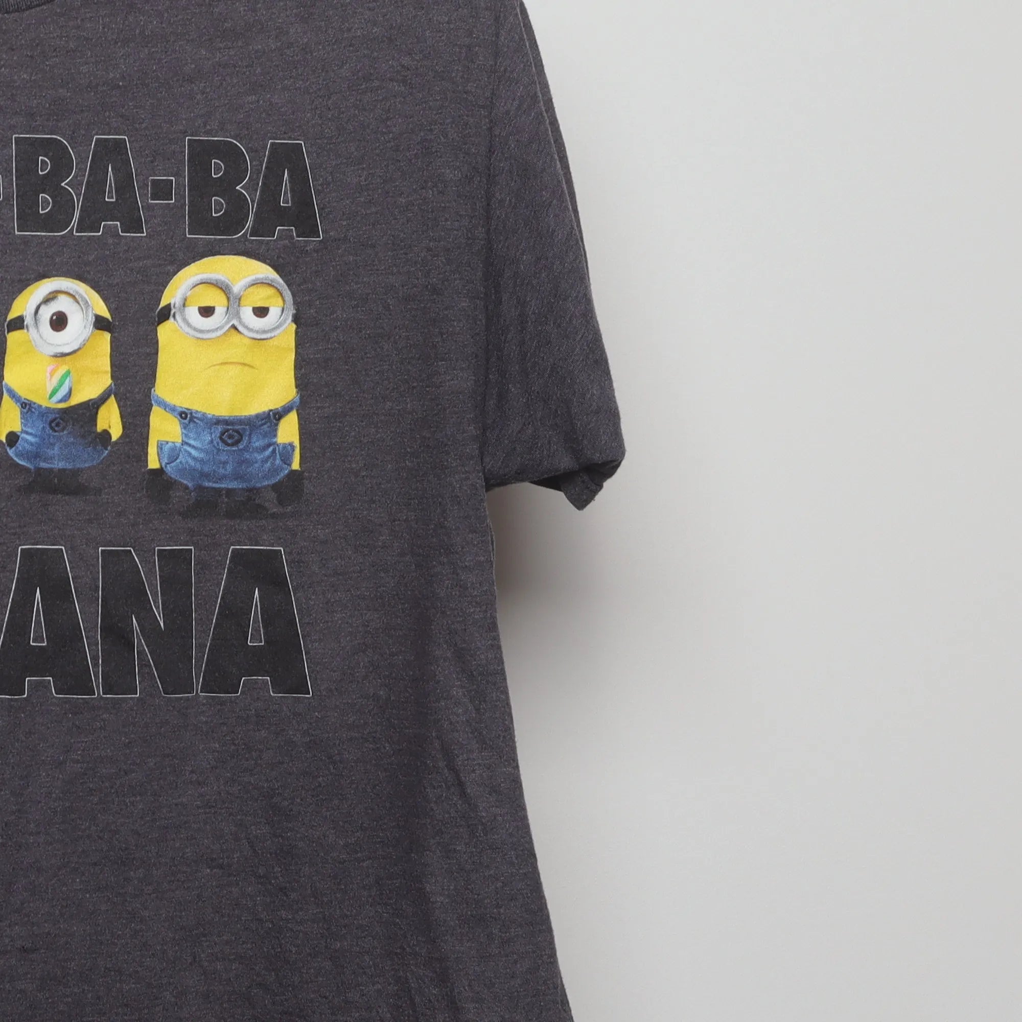 Close-up of the sleeve on the Vintage 2010s Despicable Me Minions Banana T-Shirt XL