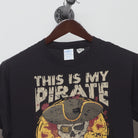 Close-up of the collar and tag on the Vintage 2010s Funny Pirate Skull T-Shirt M