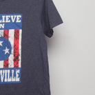 Close-up of the sleeve on the Vintage 2010s I Believe In Nashville Graphic T-Shirt M