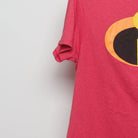 Close-up of the sleeve on the Vintage 2010s Incredibles 2 Movie Logo Tee L