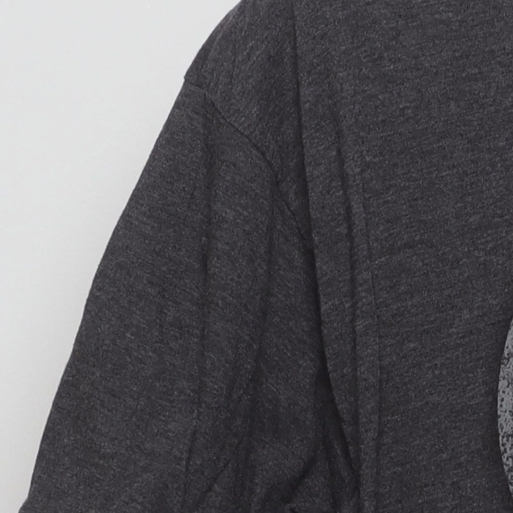 Close-up of the single stitch sleeve on the Vintage 2010s Marvel "Captain America Shield" T-Shirt - L