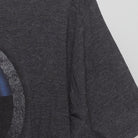 Close-up of the single stitch sleeve on the Vintage 2010s Marvel "Captain America Shield" T-Shirt - L