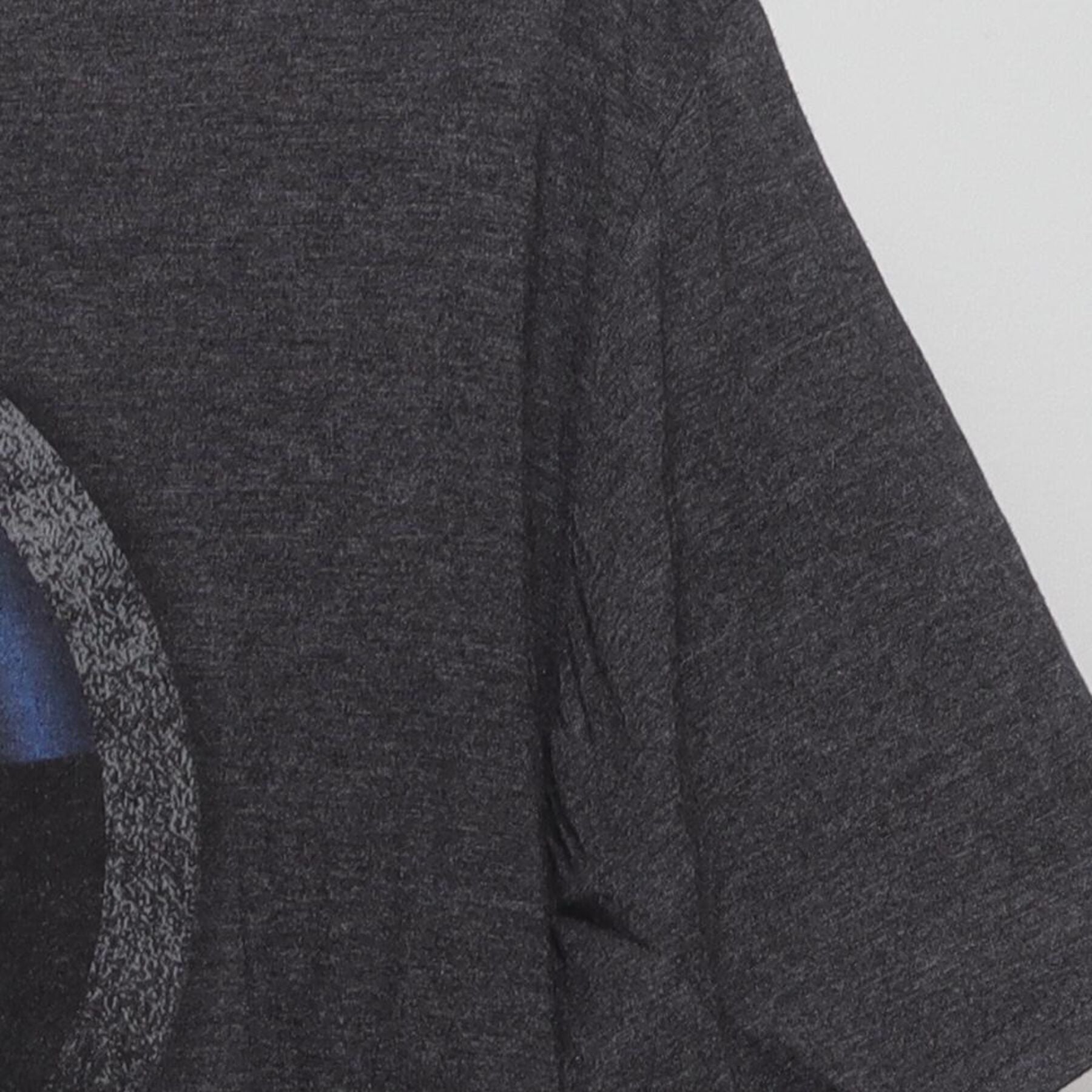 Close-up of the single stitch sleeve on the Vintage 2010s Marvel "Captain America Shield" T-Shirt - L