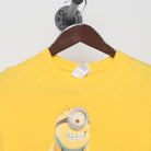 Close-up of the collar and tag on the Vintage 2010s Despicable Me "Minions Pile" T-Shirt - S