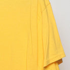 Close-up of the Right sleeve on the Vintage 2010s Despicable Me "Minions Pile" T-Shirt - S