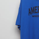 Close-up of the sleeve on the Vintage 2010s NCAA Wrestling MSG Graphic Tee XXL