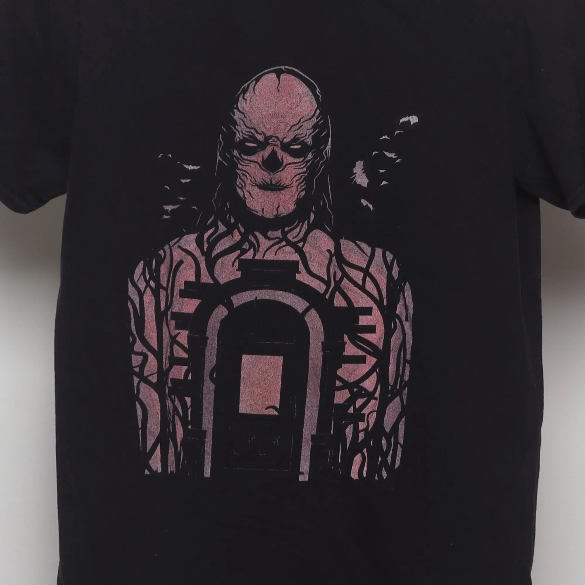 Close-up of the main graphic on the Vintage 2010s Netflix Stranger Things Vecna Tee S