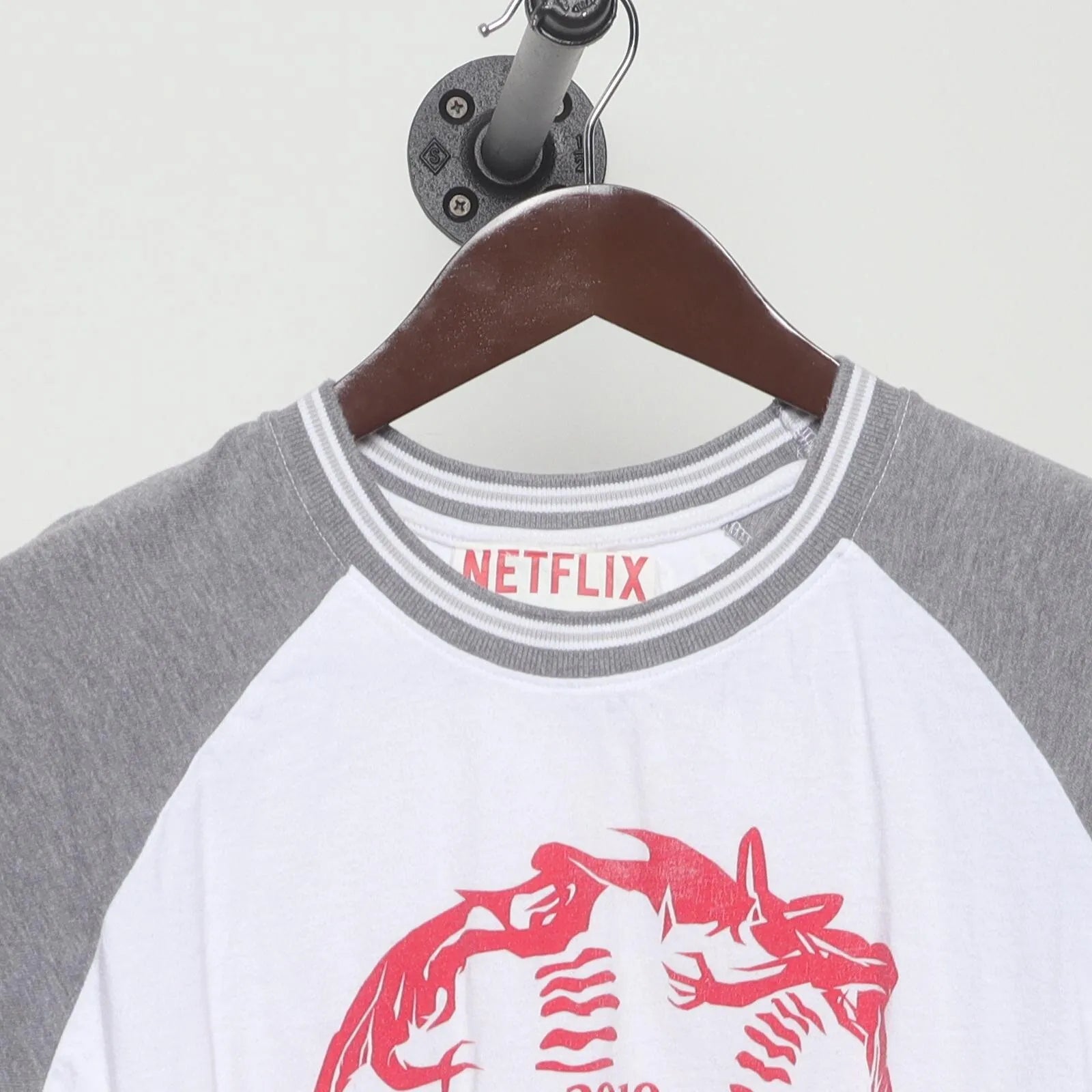 Close-up of the collar and tag on the Vintage 2010s New Era / Netflix "Stranger Things 2019 MLB All-Star Game" T-Shirt - L