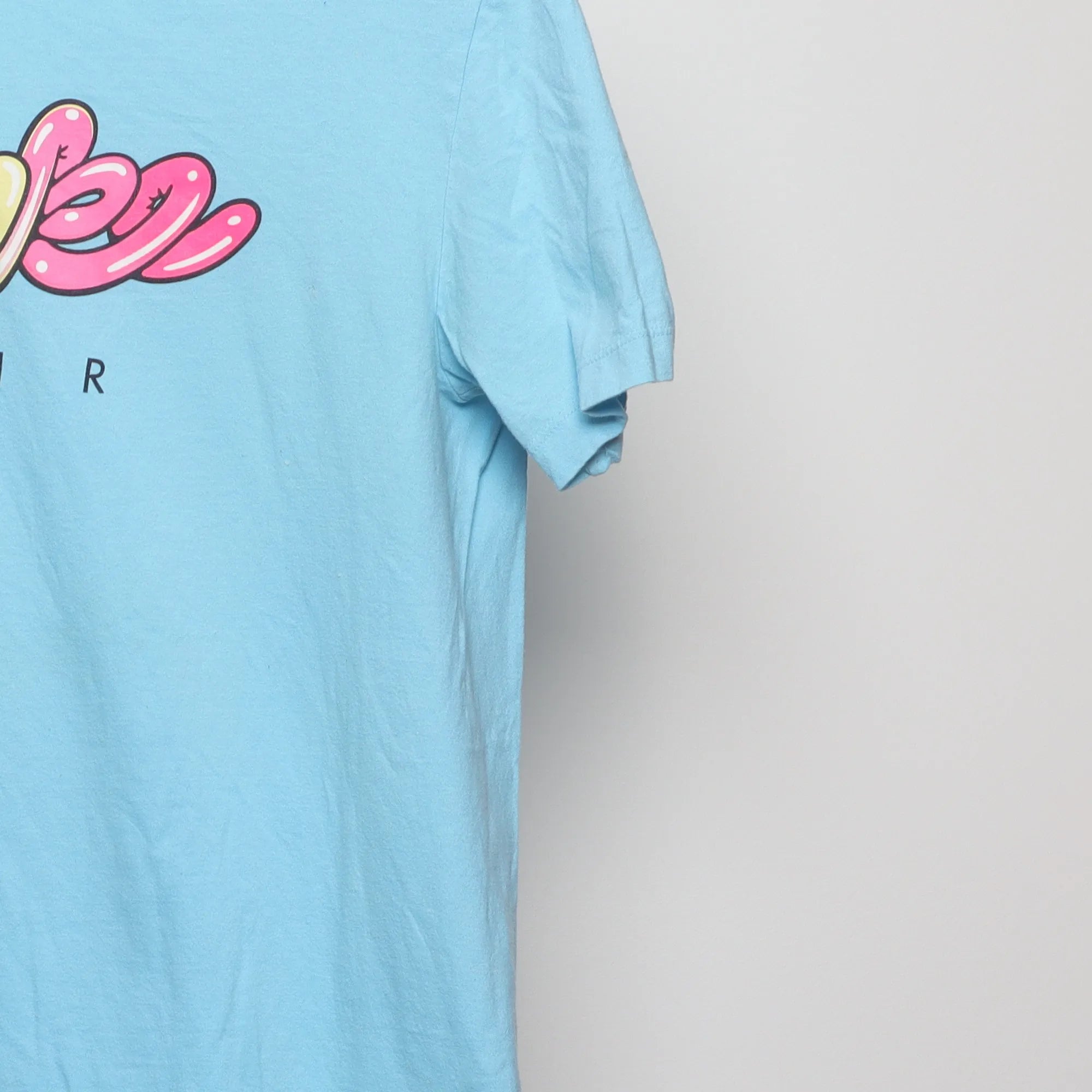 Close-up of the sleeve on the Vintage 2010s Nike Air Bubble Graffiti T-Shirt S