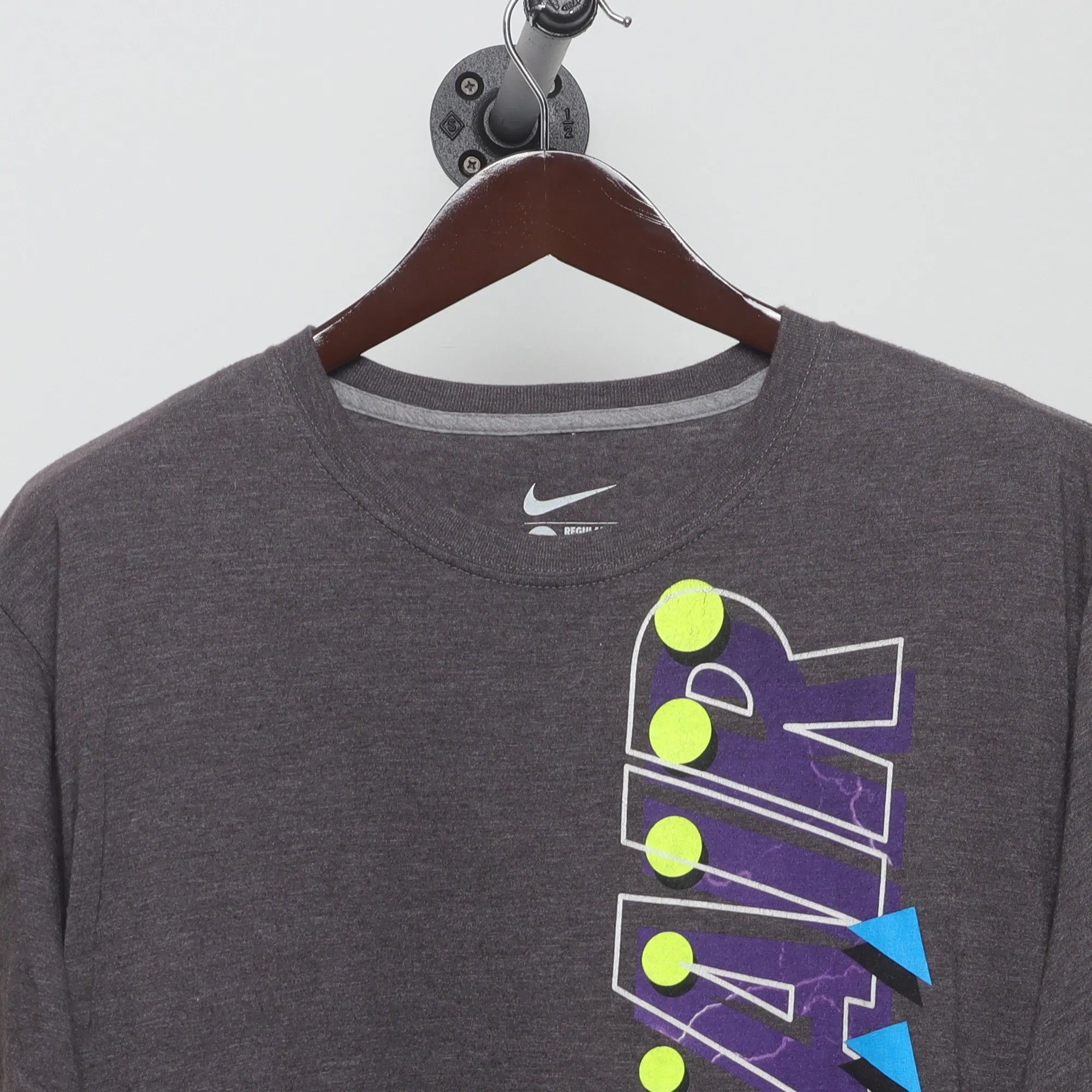 Close-up of the collar and tag on the Vintage 2010s Nike Air Graphic T-Shirt XL