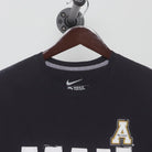 Close-up of the collar and tag on the Vintage 2010s Nike Appalachian State "Man Up" T-Shirt - S