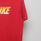 Close-up of the sleeve on the Vintage 2010s Nike Block Logo Graphic T-Shirt L