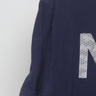 Close-up of the sleeve on the Vintage 2010s Nike "Block Logo" T-Shirt - XL