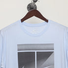 Close-up of the collar and tag on the Vintage 2010s Nike Tennis Court Graphic T-Shirt XL