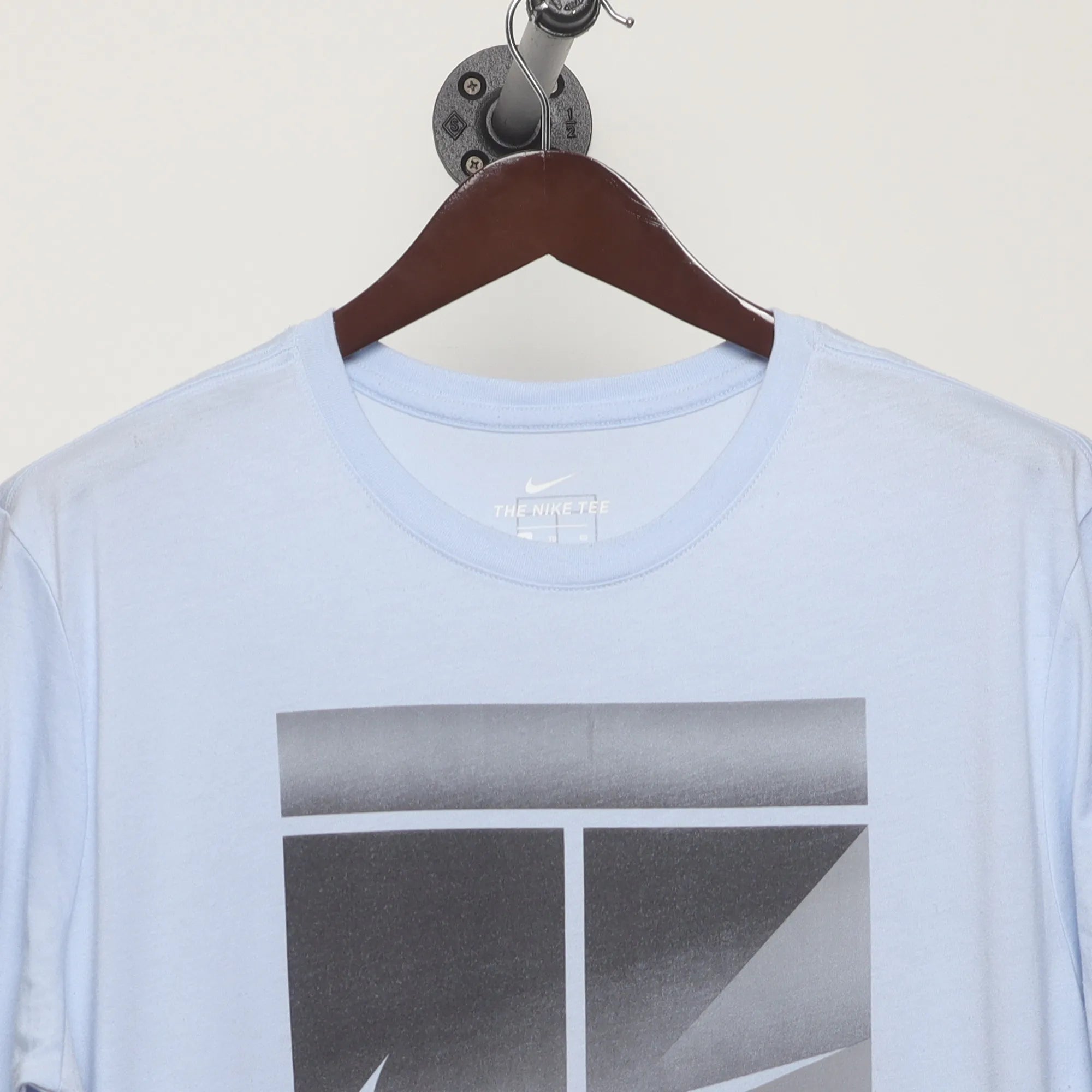 Close-up of the collar and tag on the Vintage 2010s Nike Tennis Court Graphic T-Shirt XL