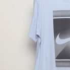 Close-up of the sleeve on the Vintage 2010s Nike Tennis Court Graphic T-Shirt XL