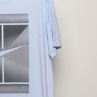 Close-up of the sleeve on the Vintage 2010s Nike Tennis Court Graphic T-Shirt XL