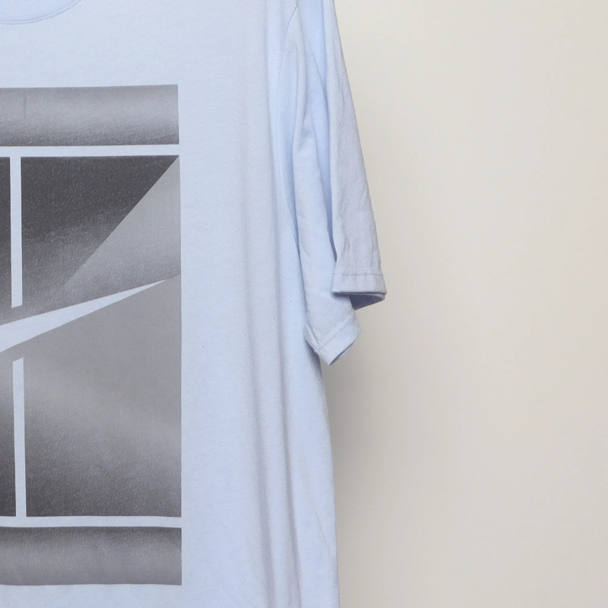 Close-up of the sleeve on the Vintage 2010s Nike Tennis Court Graphic T-Shirt XL