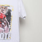 Close-up of the sleeve on the Vintage 2010s Spurs Coyote Rocky Parody Tee L