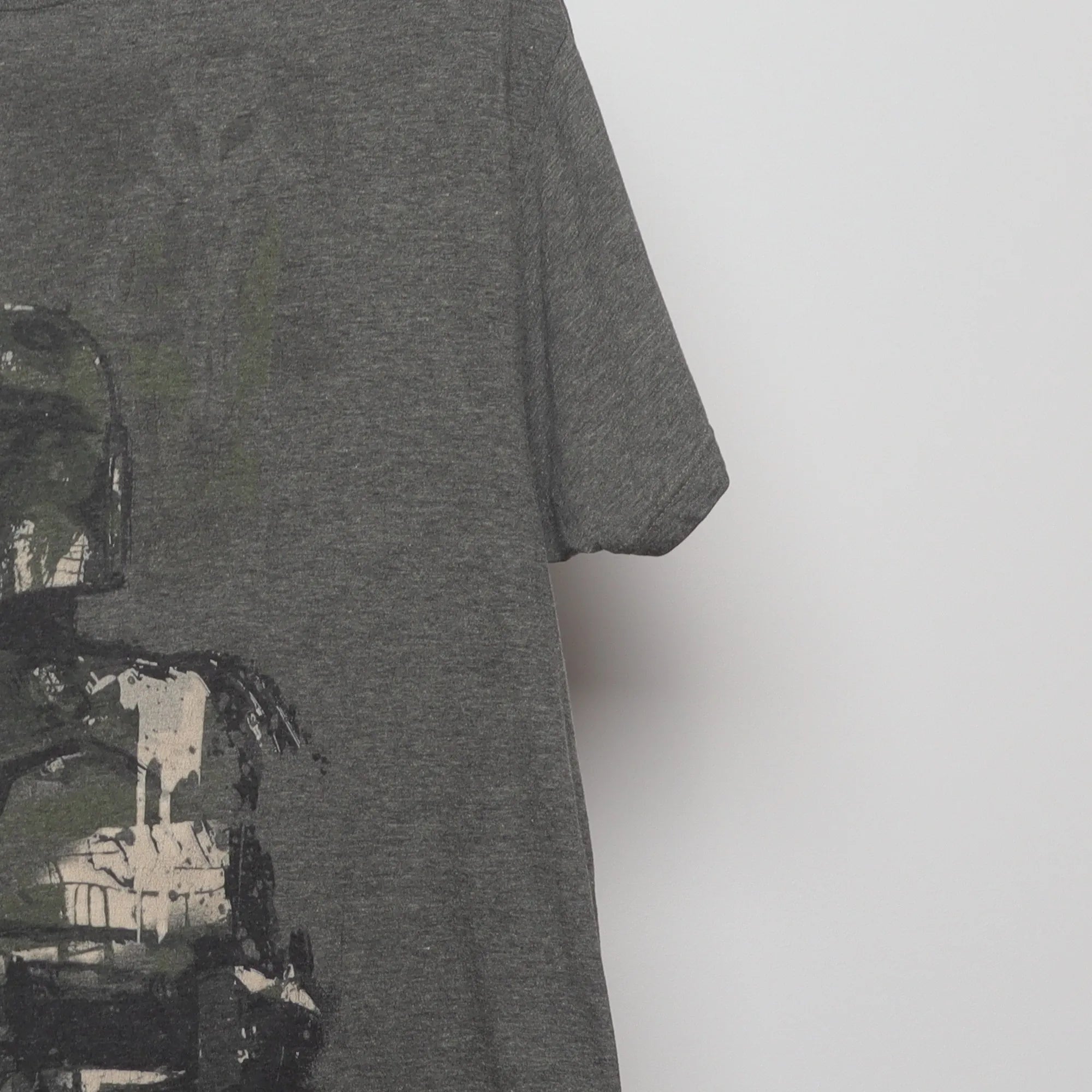 Close-up of the sleeve on the Vintage 2010s Star Wars Boba Fett Sketch Tee L