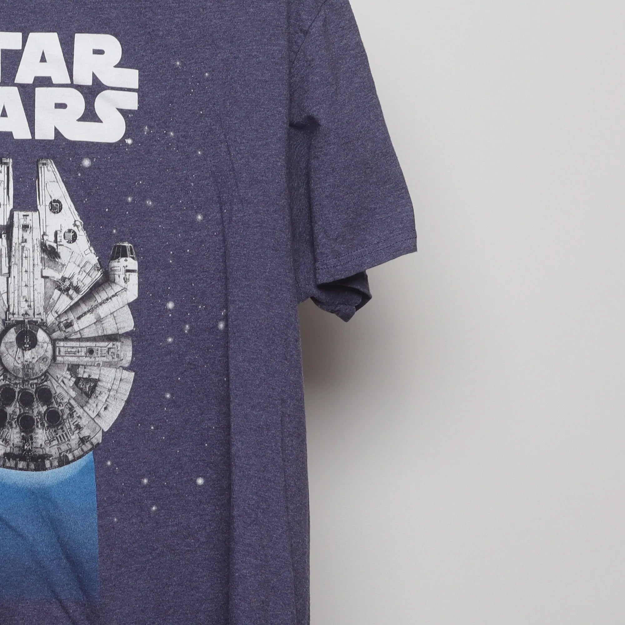 Close-up of the sleeve on the Vintage 2010s Star Wars Millennium Falcon T-Shirt M