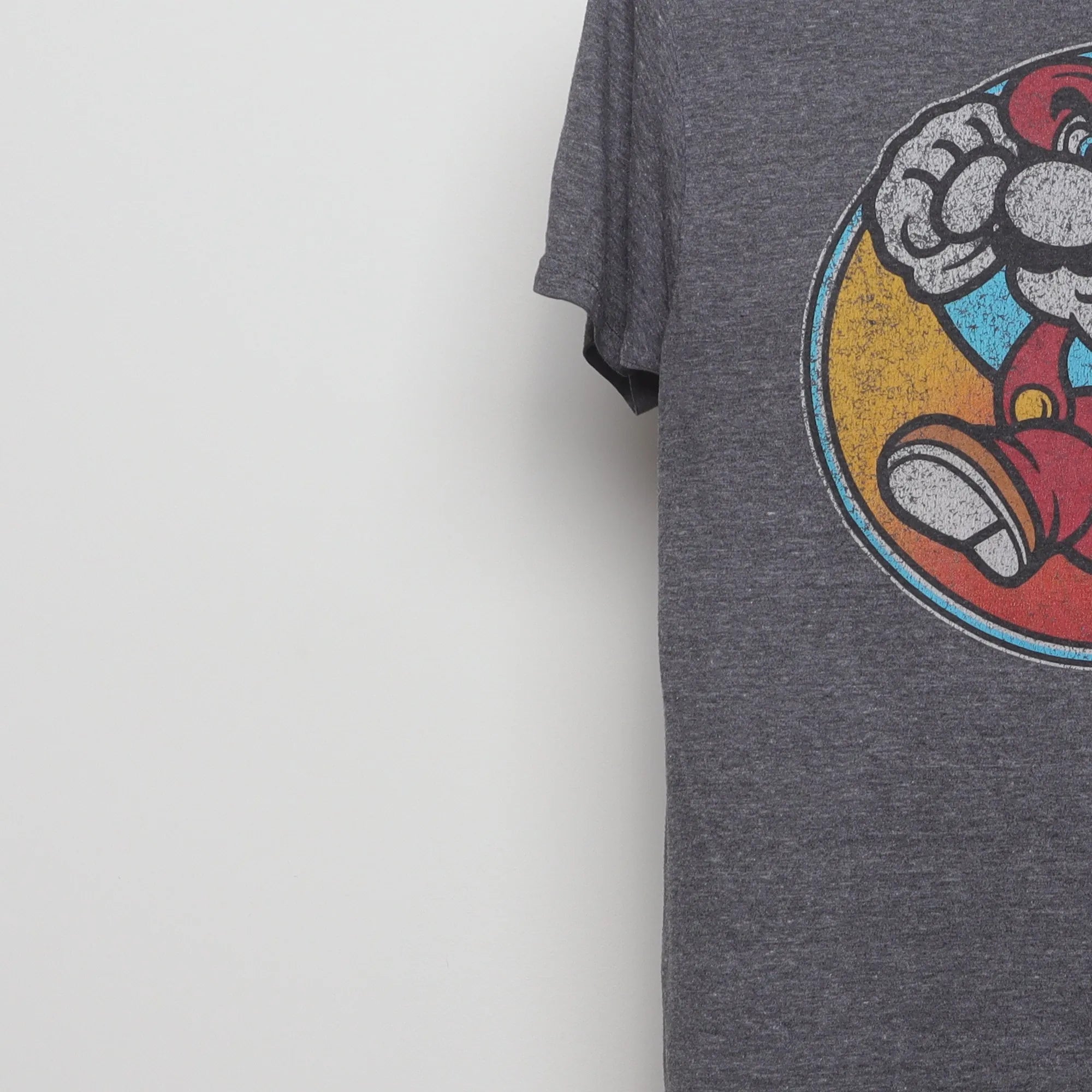 Close-up of the sleeve on the Vintage 2010s Super Mario Gamer Graphic T-Shirt S