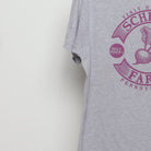 Close-up of the sleeve on the Vintage 2010s The Office Schrute Farms Graphic Tee M