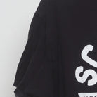 Close-up of the sleeve on the Vintage 2010s The Office "Schrute Farms" T-Shirt - XL